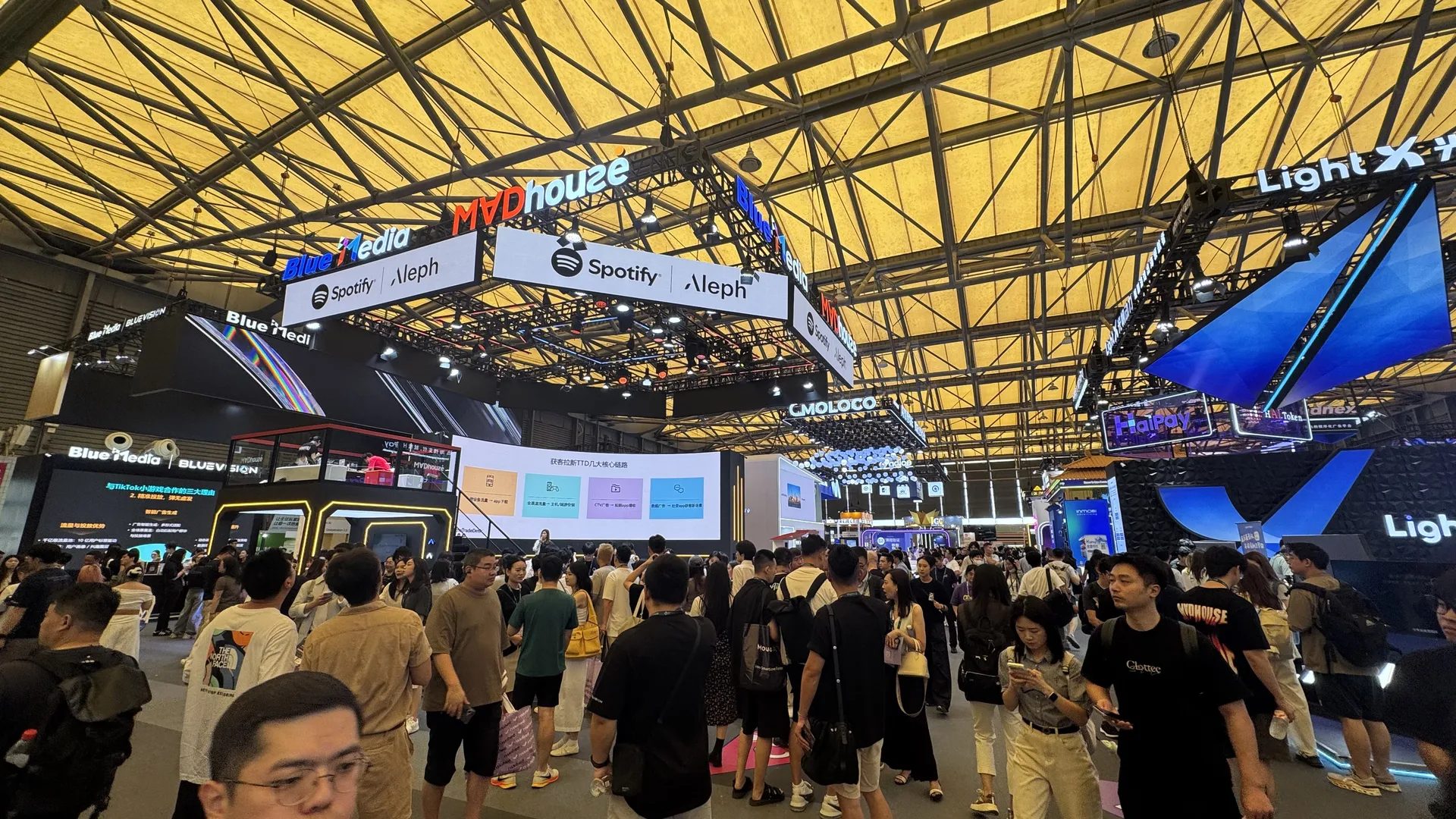 Crowds explore games and technology at a Shanghai expo